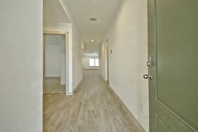 hallway featuring light wood-type flooring