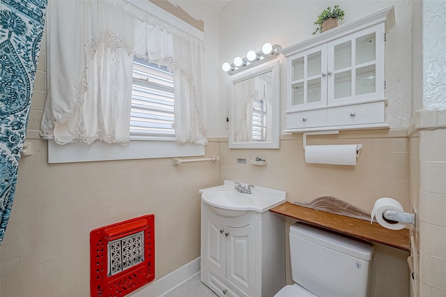 bathroom featuring toilet and vanity