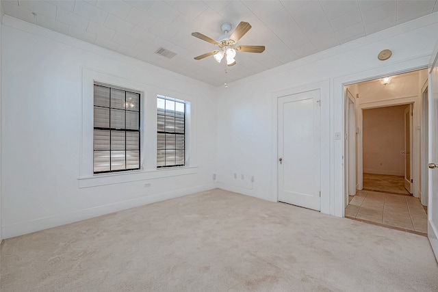 carpeted empty room with ceiling fan