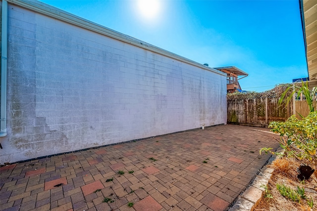 view of home's exterior with a patio