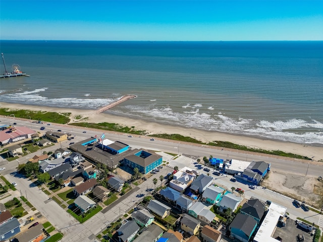 aerial view featuring a water view and a view of the beach