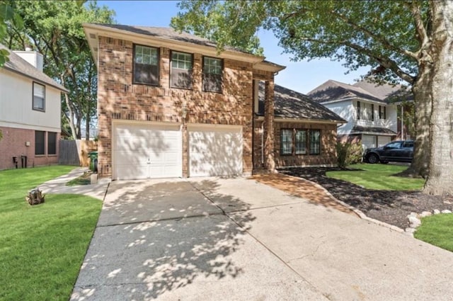 view of front of home with a garage and a front yard