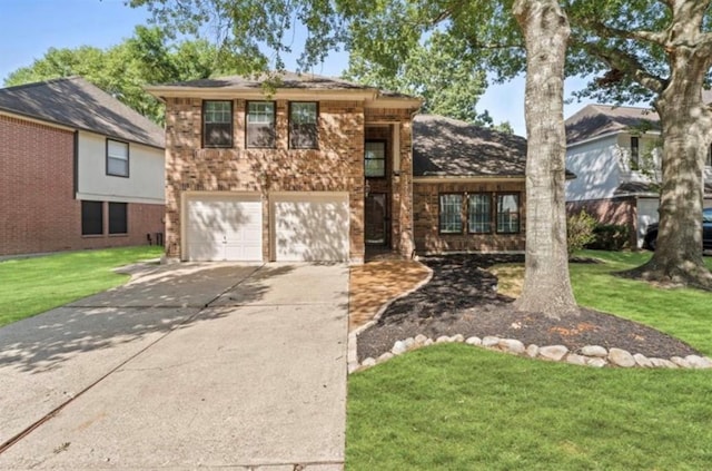 view of front of property featuring a garage and a front lawn