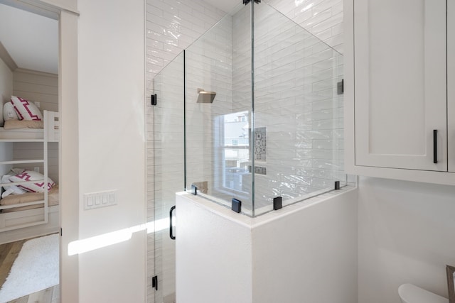 bathroom with an enclosed shower