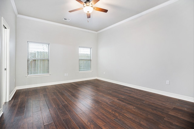 unfurnished room featuring dark wood-type flooring, ceiling fan, a healthy amount of sunlight, and crown molding