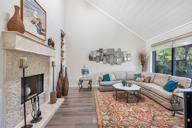 living room with wood ceiling, crown molding, wood-type flooring, and lofted ceiling