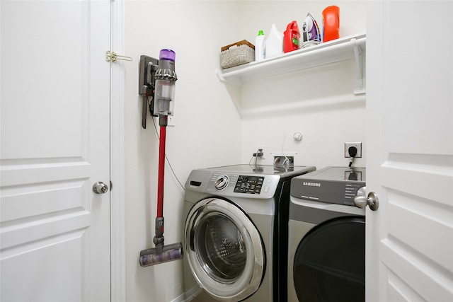 laundry room featuring washer and clothes dryer