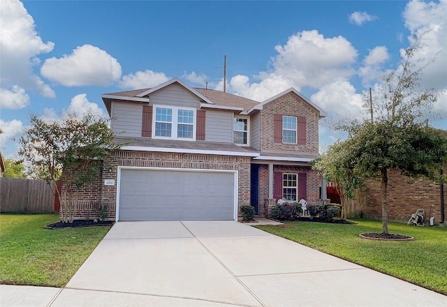 view of front of home featuring a garage and a front yard