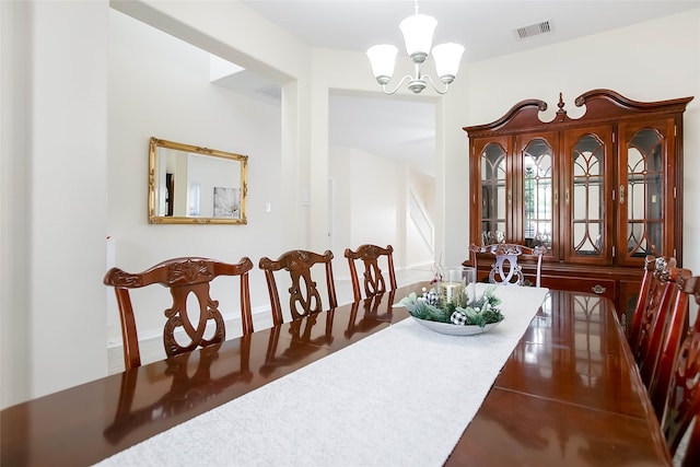 dining room with a chandelier