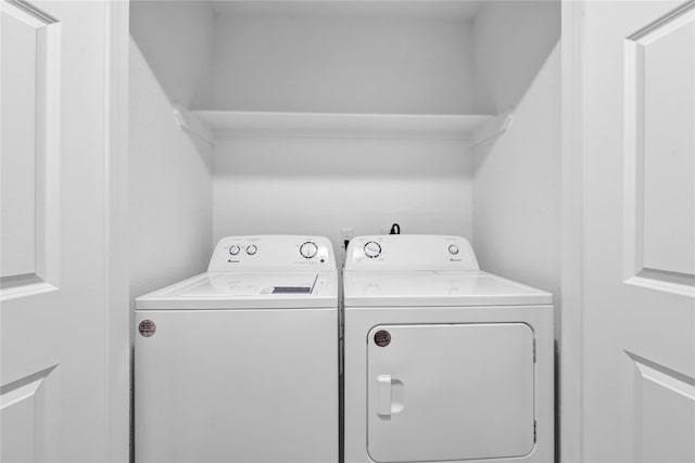 laundry area with washer and clothes dryer