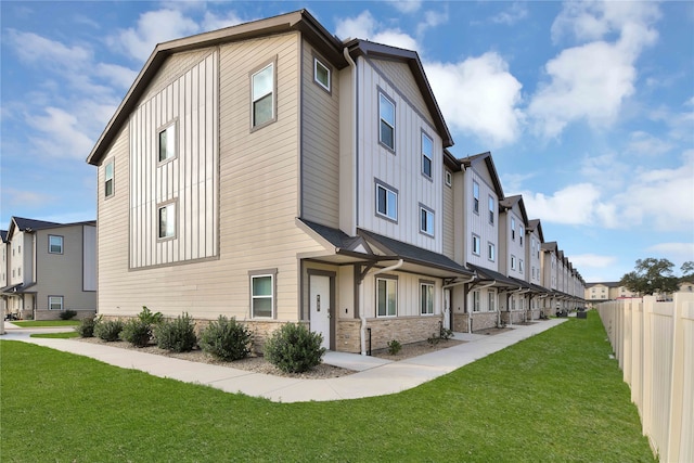 view of home's exterior featuring a yard