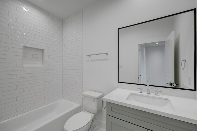 full bathroom with vanity, toilet, and tiled shower / bath combo