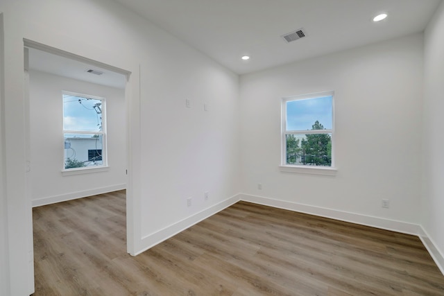 spare room with light wood-type flooring