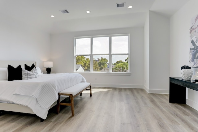 bedroom with light hardwood / wood-style flooring