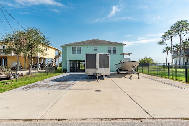 rear view of house with a carport