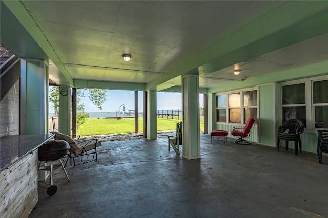 view of patio / terrace featuring a water view