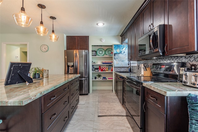 kitchen with decorative backsplash, appliances with stainless steel finishes, dark brown cabinetry, and hanging light fixtures