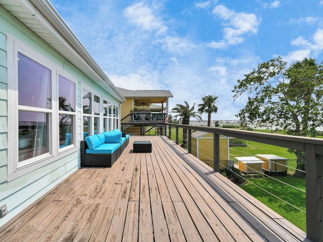 wooden deck featuring an outdoor hangout area