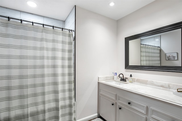 bathroom with vanity and a shower with curtain