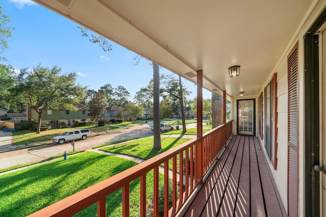 balcony featuring a porch