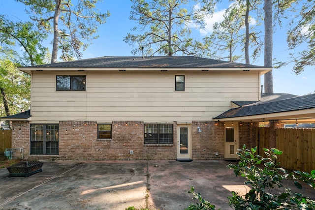 rear view of house with a patio