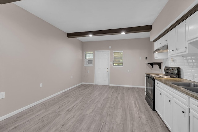 kitchen featuring backsplash, black / electric stove, white cabinets, light wood-type flooring, and beamed ceiling