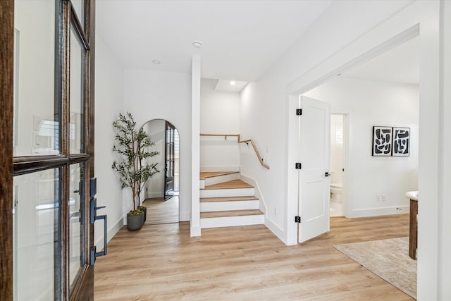 entrance foyer with light hardwood / wood-style flooring