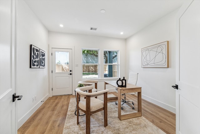 office space featuring light hardwood / wood-style floors