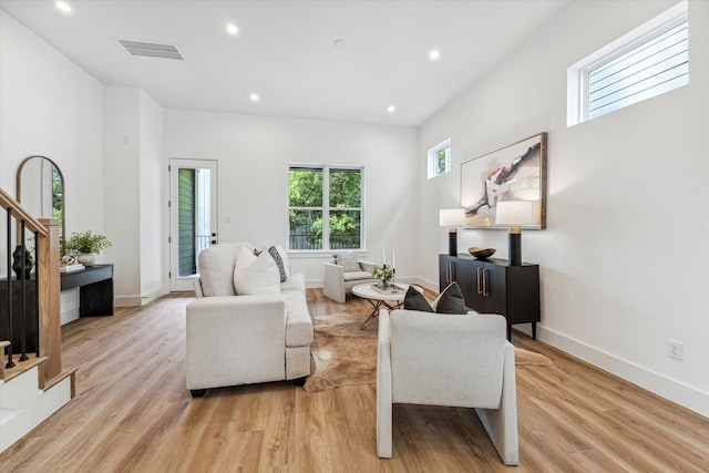 living room with light hardwood / wood-style floors