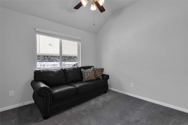 living room featuring vaulted ceiling, ceiling fan, and dark carpet