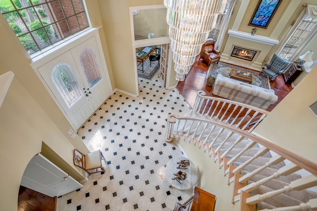 entryway with a towering ceiling