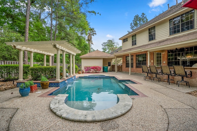 view of swimming pool with an outdoor bar, a pergola, and a patio area