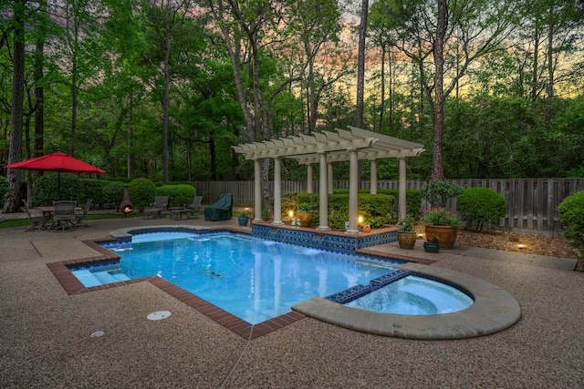 view of pool with a pergola, a patio, and an in ground hot tub