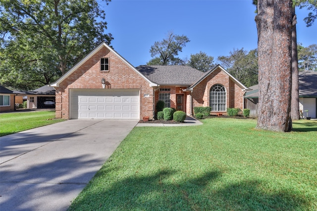 front of property featuring a garage and a front lawn