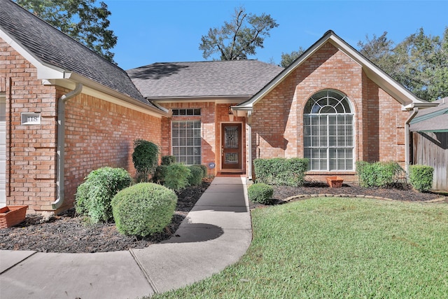 view of front of property with a front lawn