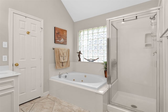 bathroom with tile patterned flooring, vanity, lofted ceiling, and shower with separate bathtub