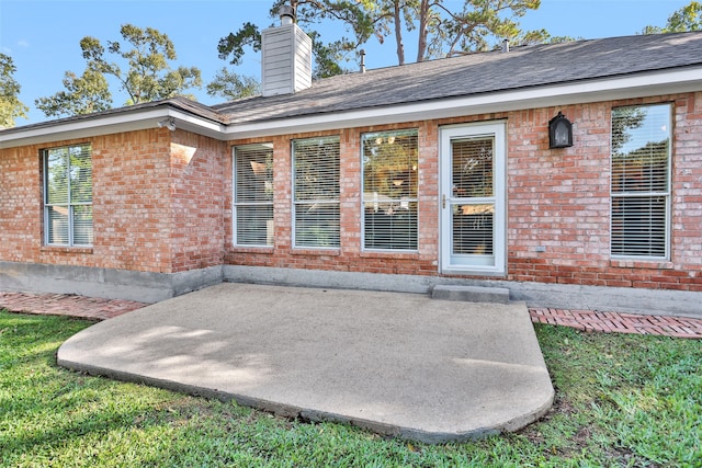 back of house with a patio area