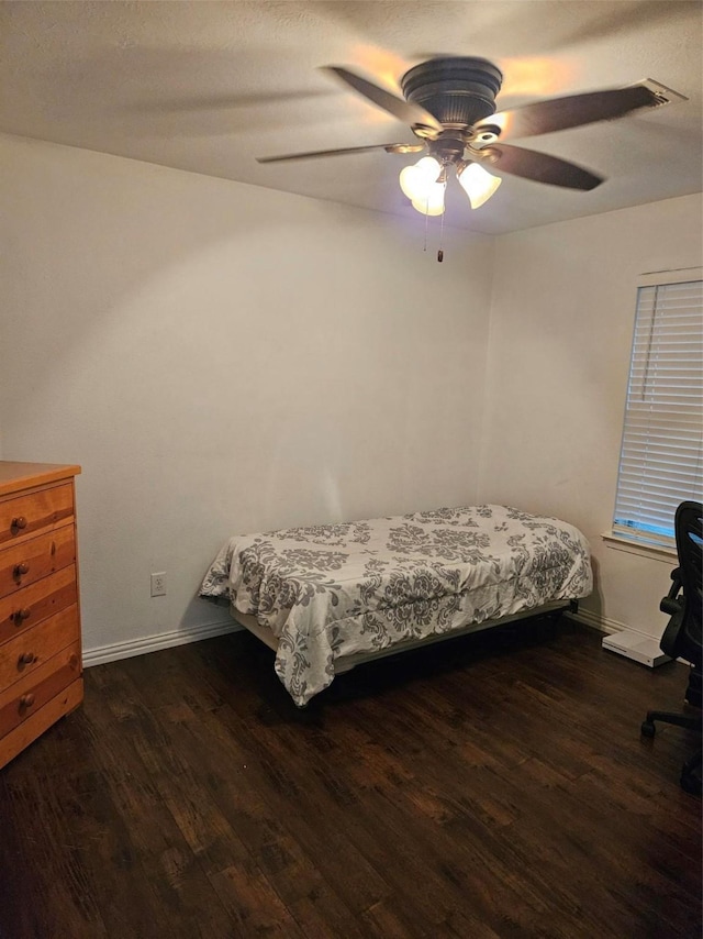 10438 Lauren Creek Dr, Baytown, TX 77523 - bedroom featuring wood finished floors, baseboards, and ceiling fan