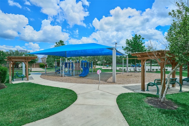 view of play area featuring a lawn