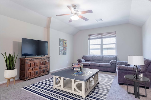 carpeted living room featuring lofted ceiling and ceiling fan