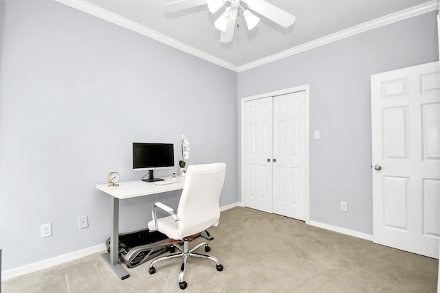 office space featuring ceiling fan, light colored carpet, and ornamental molding