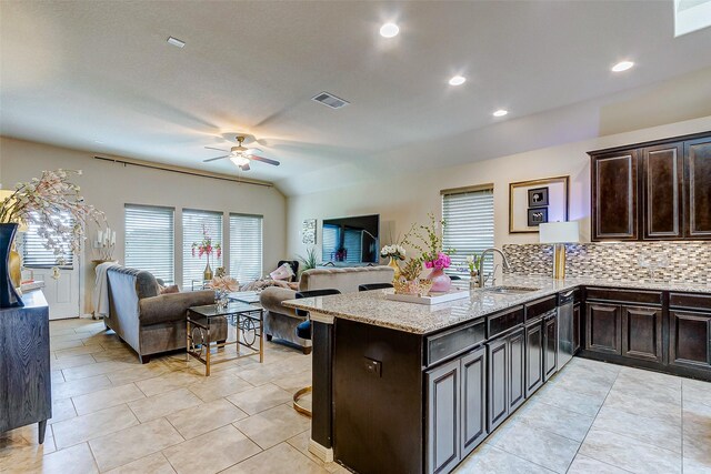 3614 Daintree Park Dr, Katy, TX 77494 - kitchen featuring a sink, open floor plan, a ceiling fan, healthy amount of natural light, and recessed lighting