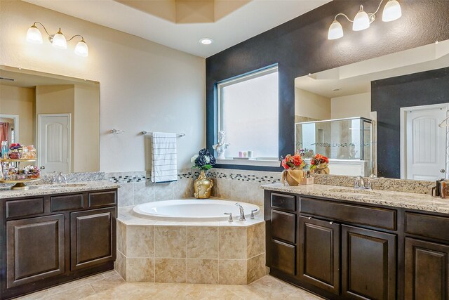 3614 Daintree Park Dr, Katy, TX 77494 - full bathroom with a shower stall, two vanities, a garden tub, and tile patterned floors