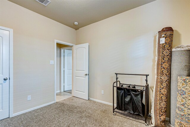 3614 Daintree Park Dr, Katy, TX 77494 - unfurnished bedroom with light colored carpet and baseboards