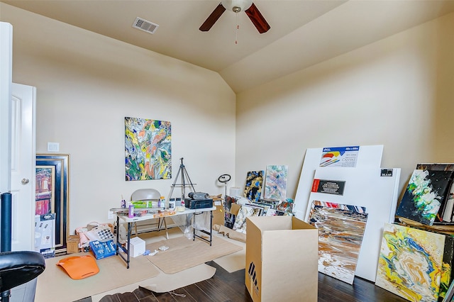 office space with ceiling fan, dark hardwood / wood-style floors, and lofted ceiling