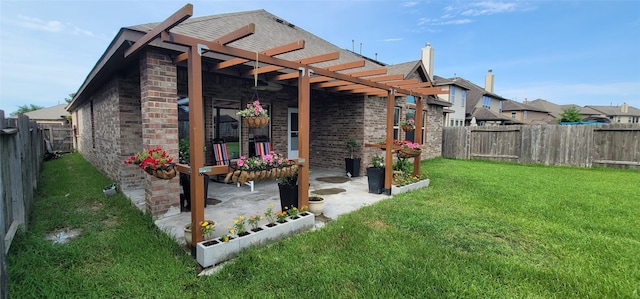 view of yard featuring a patio area and a pergola