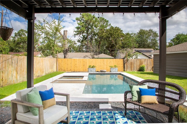 view of pool featuring a patio area and an in ground hot tub