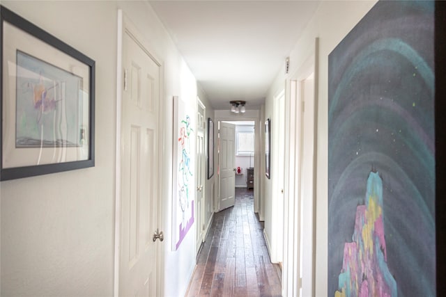 hall with dark hardwood / wood-style floors