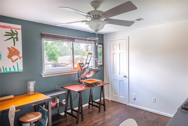 office area featuring dark hardwood / wood-style flooring and ceiling fan