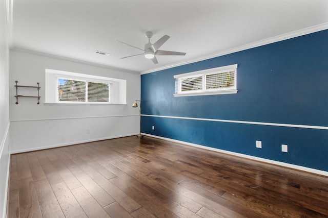 spare room with hardwood / wood-style floors, ceiling fan, and crown molding